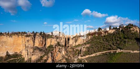 Panorama aerial view of the old town of Ronda and the Puente Nuevo over El Tajo Gorge Stock Photo