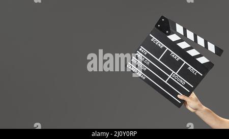 Hand with movie slate. High quality photo Stock Photo