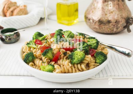 Vegetarian pasta fusilli with tomato broccoli. High quality photo Stock Photo