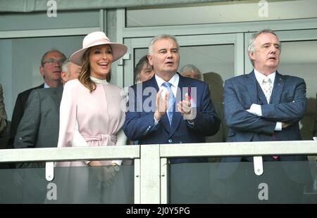 Eamonn Holmes and co presenter Isabel Webster (wearing pink)   Day 2, racing at the Cheltenham Gold Cup Festival at Cheltenham Racecourse.    Ladies d Stock Photo