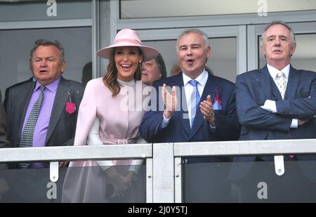 Eamonn Holmes and co presenter Isabel Webster (wearing pink)   Day 2, racing at the Cheltenham Gold Cup Festival at Cheltenham Racecourse.    Ladies d Stock Photo