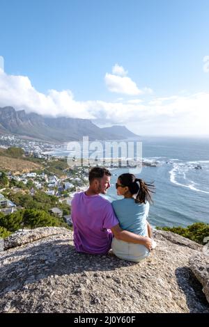 View from The Rock viewpoint in Cape Town over Campsbay, view over Camps Bay with fog over the ocean Stock Photo