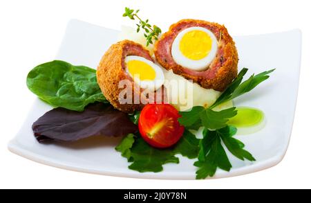Scotch eggs with vegetables Stock Photo