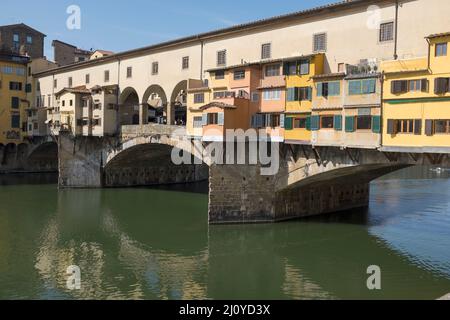 View along River Arno to Ponte Vecchio Bridge in Florence Italy Stock Photo
