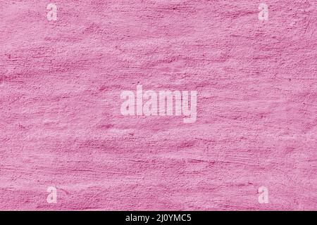 Pink stucco texture. Designer interior background. Abstract architectural surface. Stock Photo
