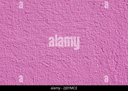 Pink stucco texture. Designer interior background. Abstract architectural surface. Stock Photo