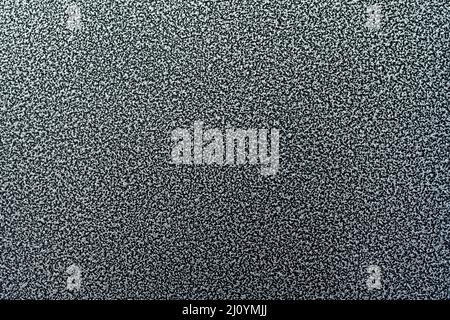 Etched dark metal texture. Abstract black background. Stock Photo