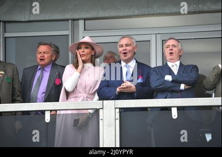 Eamonn Holmes and co presenter Isabel Webster (wearing pink)   Day 2, racing at the Cheltenham Gold Cup Festival at Cheltenham Racecourse.    Ladies d Stock Photo