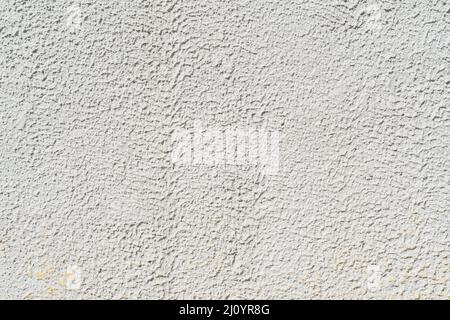 Gray stucco on wall of house. Construction industry. Stock Photo