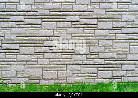 Gray brick wall. Dark abstract background. Building brick construction. Stock Photo