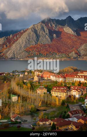 Riano cityscape at sunrise with mountain range landscape during Autumn in Picos de Europa national park, Spain Stock Photo