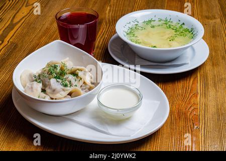 Breakfast including compote, salad, soup Stock Photo