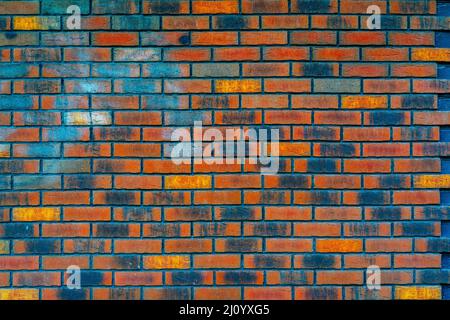 Red brick wall. Interior of a modern loft. Background for photo and video filming. The facade of a brick building. Stock Photo