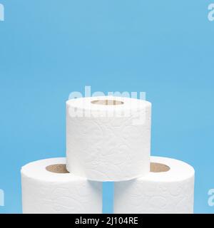 Front view three stacked toilet paper rolls with copy space Stock Photo