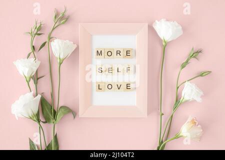 Top view pink frame flowers arrangement Stock Photo