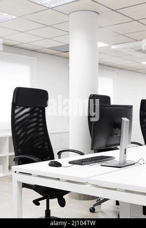 Empty conference room with black office chairs Stock Photo