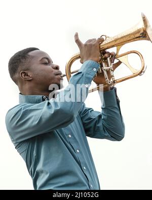 Young man playing music jazz day Stock Photo