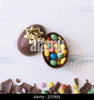 Close up egg with candies bow Stock Photo