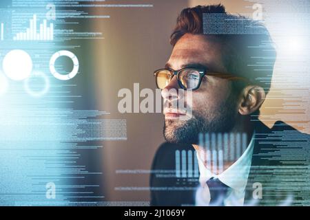 Taking a look at the source code. Cropped shot of a handsome young businessman coding late in the office. Stock Photo