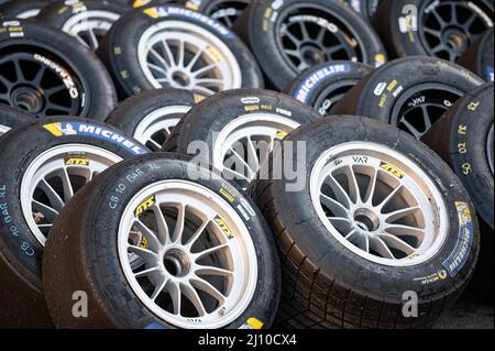 Closeup of the racing wheels on the racing circuit Stock Photo