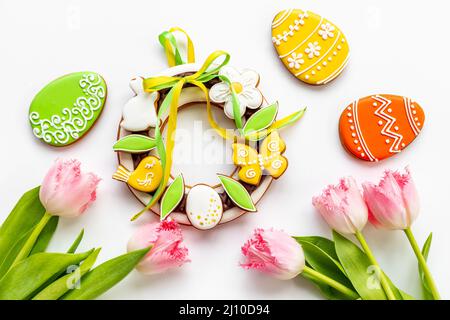 Easter cookies with tulips flowers. Happy Easter greeting card Stock Photo