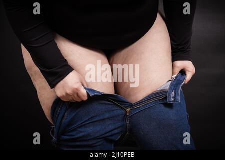 Black skin tight jeans hi-res stock photography and images - Page 2 - Alamy