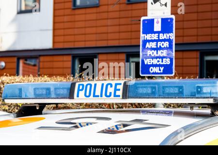 Epsom Surrey London UK, March 21 2022, Police Car In Offical Parking Bay With Public Notice Stock Photo