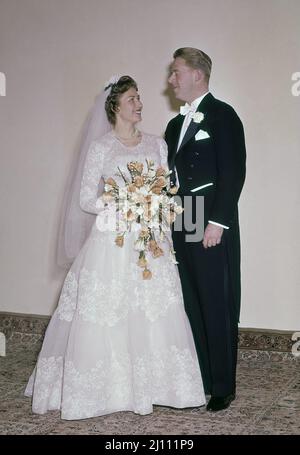 SKAUGUM 19610112 Princess Astrid's wedding Princess Astrid marries Johan Martin Ferner. The bride and groom pose at Skaugum after the wedding. Photo: NTB / NTB Stock Photo