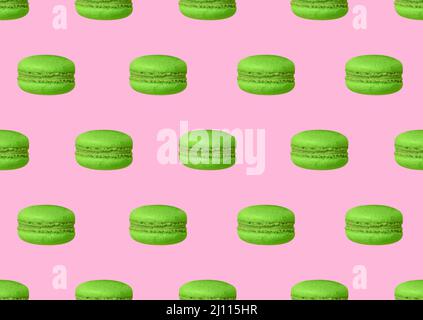 Bright green french biscuits on pink backdrop Stock Photo