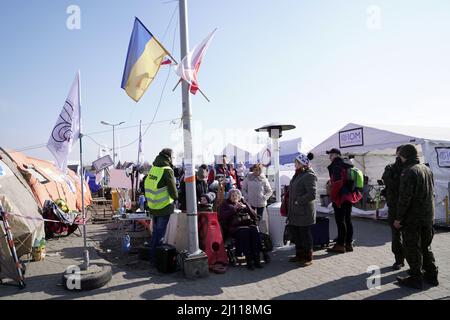 MEDYKA, POLAND - MARCH 20, 2022 - Ukrainian refugees cross into Poland via the Medyka checkpoint, Poland. Stock Photo
