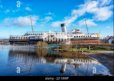 BALLOCH, SCOTLAND - MARCH 01, 2022: The maid of the loch paddle steamer under restoration by a group of volunteers. Stock Photo