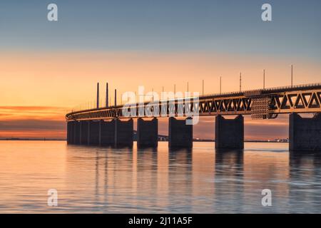 long exposure of the Oresund Bridge between Denmark and Sweden at sunset Stock Photo