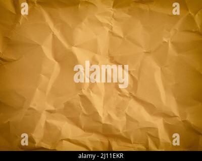 A Yellow Texture Background. Crumpled Paper. Close up. Stock Photo