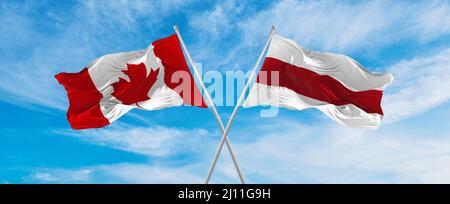 Belarus and Canada flag waving in the wind against white cloudy blue ...