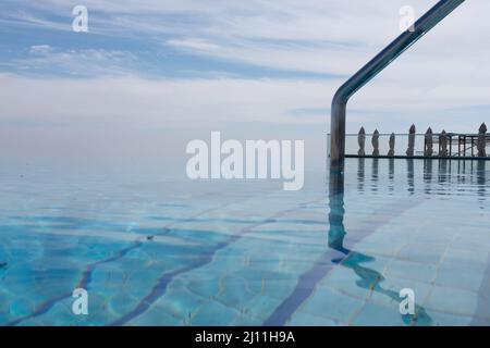 Luxury Resort Infinity Pool Stock Photo