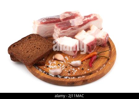 Raw pork belly with streaks of fat isolated on white background Stock Photo