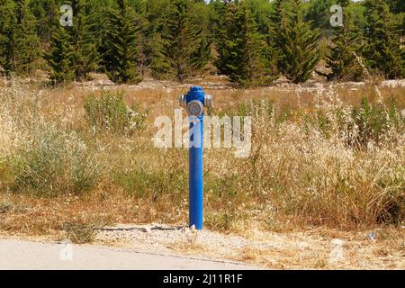 Fire hidrant for emergency fire access. Typical red fire hydrant. Stock Photo