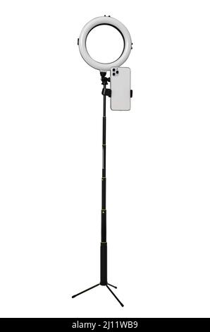 tripod with a lamp for a selfie on a white background in isolation Stock Photo