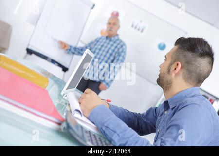 teacher and students in the class room Stock Photo