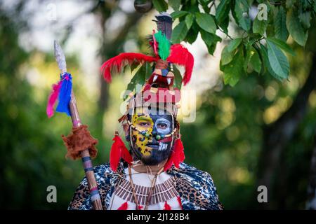 Guests in indigenous costumes at the reception hosted by the Governor General of Belize Froyla Tzalam, at the Mayan ruins at Cahal Pech, for the Duke and Duchess of Cambridge during their tour of the Caribbean on behalf of the Queen to mark her Platinum Jubilee. Picture date: Monday March 21, 2022. Stock Photo