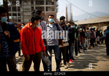 Kathmandu, Nepal. 20th Mar, 2022. People line up to apply for joining a temporary police force in Kathmandu, Nepal, March 20, 2022. Credit: Sulav Shrestha/Xinhua/Alamy Live News Stock Photo