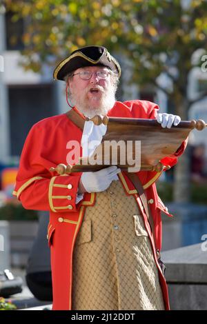 Stephen Symons, the City of Christchurch Towncrier reads the daily proclamation in Cathedral Square. Stock Photo