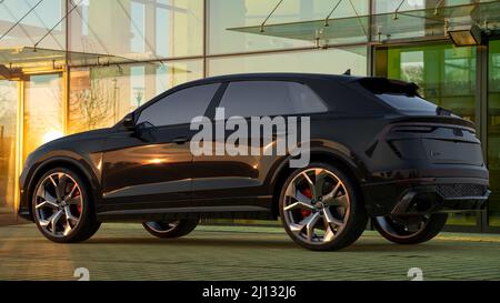 Audi RSQ8 on the road at sunset Stock Photo