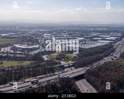 Birstall - March 2022: Junction 27 Retail Park with motorway in view Stock Photo