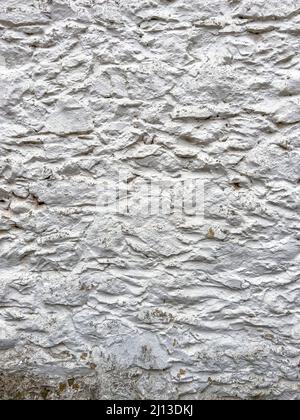 Stone wall texture. Part of old rocky hand crafted background with copy space. Walls made of natural bricks. High quality photo. Home and office decor Stock Photo