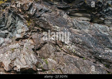 Close-up portrait mountain rocks formation. Background, texture. Natural background. Grunge texture. Stock Photo