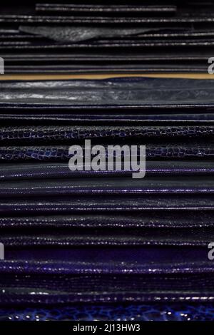 Black and dark blue reptile leather samples collection texture background Stock Photo