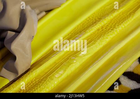 Yellow and beige leather samples texture background Stock Photo