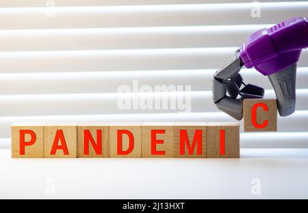 pandemic word written on wood block. pandemic text on wooden table for your desing Stock Photo