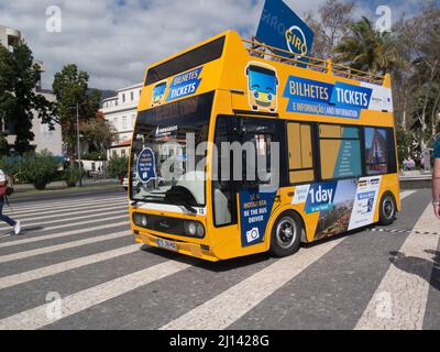 Yellow bus used as sales office to sell tickets for local buses on  Promenade Funchal Madeira Portugal EU Stock Photo - Alamy
